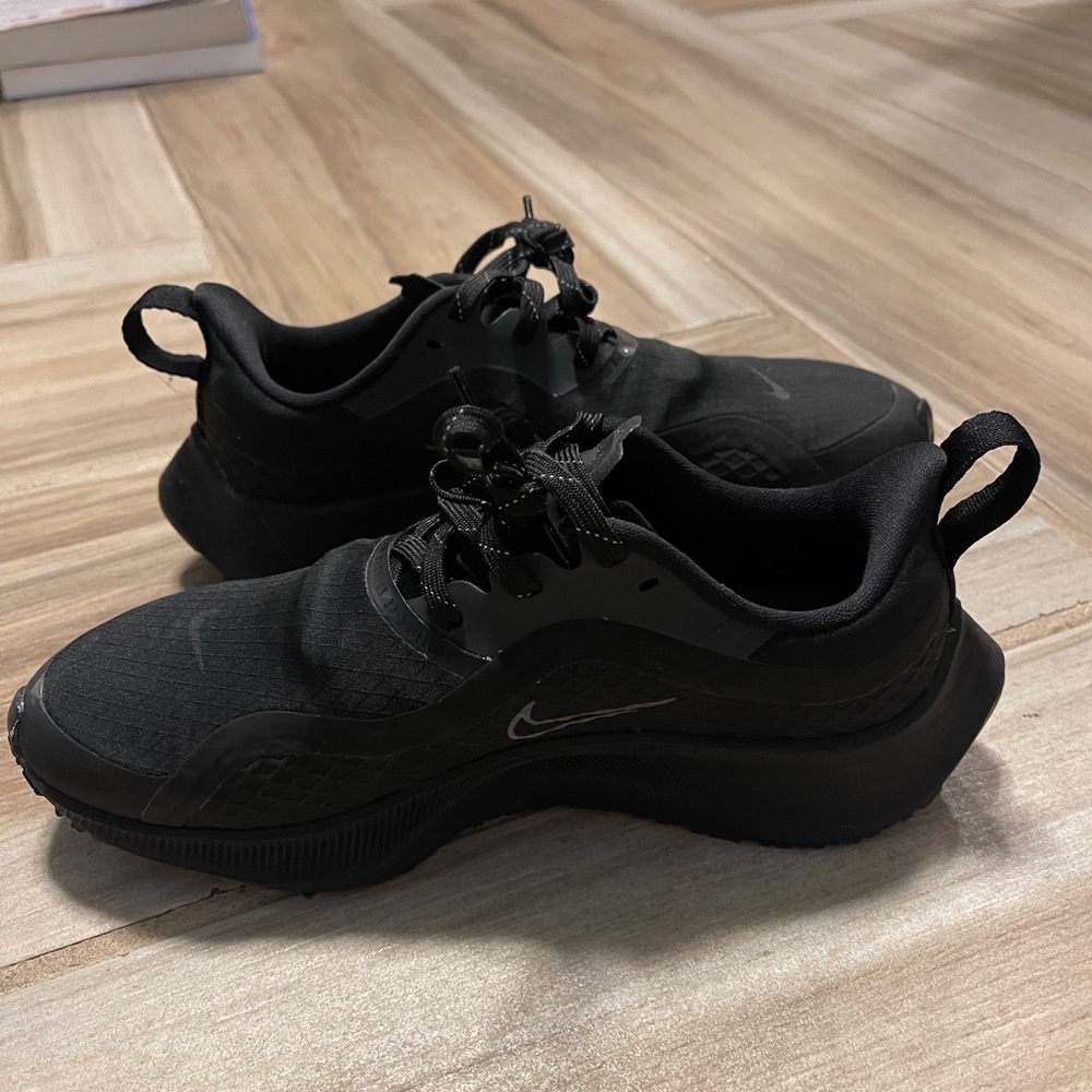 Nike shoes. Brand new, worn once outside but realized they were too small.